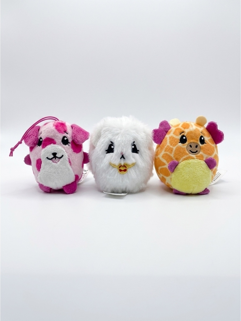 Set of 3 Plush Pikmi Pops Toys – Pink Dog, White Owl, and Orange Giraffe
